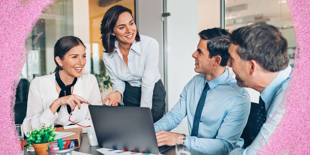 Diverse team collaborating in modern office meeting